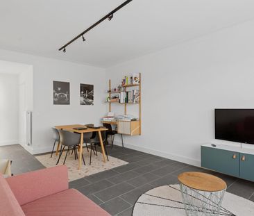 Gelijkvloers appartement met terras en tuin. - Foto 4