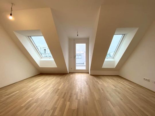 Oberstes Stockwerk! Klimatisierte DG-Wohnung mit 10m² Terrassenfläche!!! - Photo 1