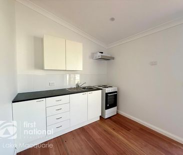 RENOVATED 2 BEDROOM UNIT - LAWN MAINTENANCE INCLUDED - Photo 2