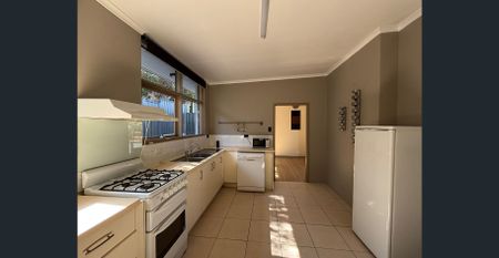 Freshly Updated 3-Bedroom Home with New Landscaping & Semi Furnished Comfort - Photo 2