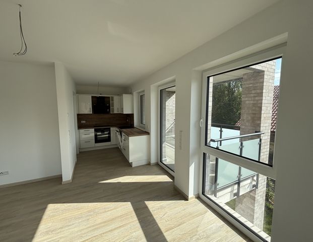 Erstbezug - Moderne Obergeschosswohnung im Zentrum von Wiefelstede - Photo 1