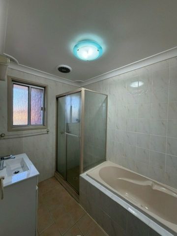 Three Bedroom Home with Ducted Air Conditioning and Double Garage - Photo 2