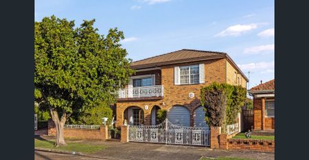 GENEROUSLY OVERSIZED FIVE BEDROOM HOME - Photo 2