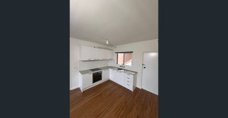 Freshly Renovated Coastal Unit with Italian Appliances in Prime Hamilton Hill - Photo 3