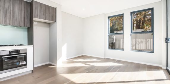 Modern two bedroom unit - 20% below market rent - Photo 2