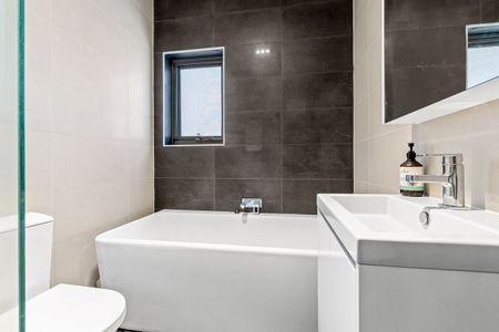 Modern Three Bedroom Home with Quality Finishes Throughout! - Photo 5