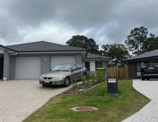 Modern Family Living in the Heart of Pimpama! - Photo 1