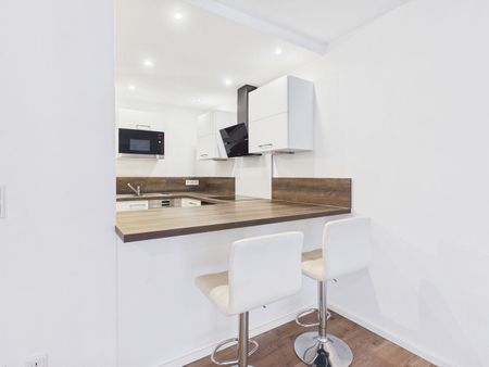 Renovierte 2-ZKB-Erdgeschosswohnung, ruhige Lage, Tiefgaragenstellplatz, EBK, nahe Klinikum-IN! - Foto 4