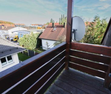 Gemütliche 2-Zimmer-Dachgeschosswohnung mit Balkon und guter Verkeh... - Foto 4