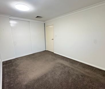 SPACIOUS AND WELL PRESENTED HOME - Photo 4