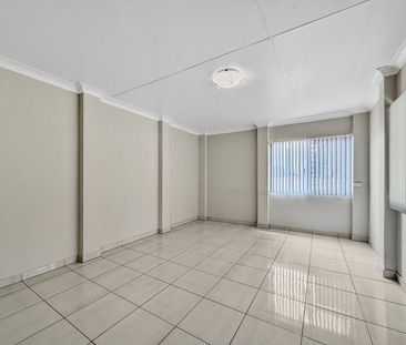 NEAT & LOW-MAINTENANCE FLAT IN GREAT LOCATION - Photo 1