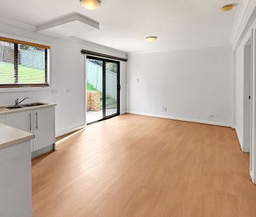 Neat & Tidy Downstairs Duplex with Private Yard - Photo 6