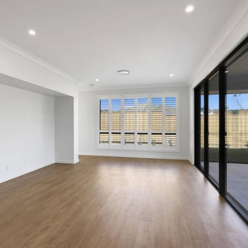 Brand New Family Living in Sought-After Ashbourne Estate - Photo 1