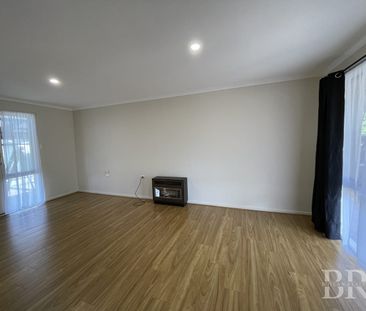 Refreshed Family Home with Spacious Yard and Powered Shed - Photo 1
