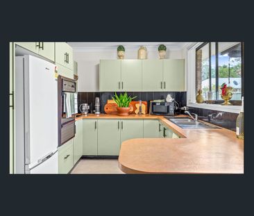 Easy-Care Living with Outdoor Charm - Photo 6