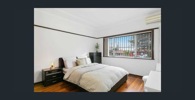 Spacious Brick Family Home with Flexible Living Options - Photo 1