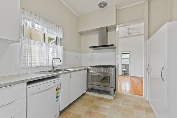 Spacious Top-Floor Unit with Huge Private Courtyard - Photo 1