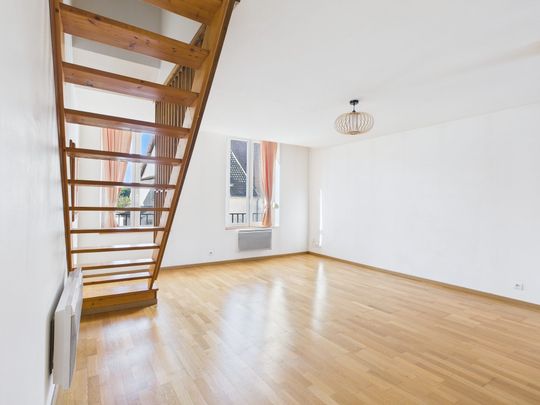 Compromis entre l'appartement et la maison - Photo 1