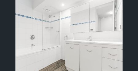 Beautifully Updated & Spacious Split-Level Apartment; Parking & Storage - Deposit Received - Photo 4