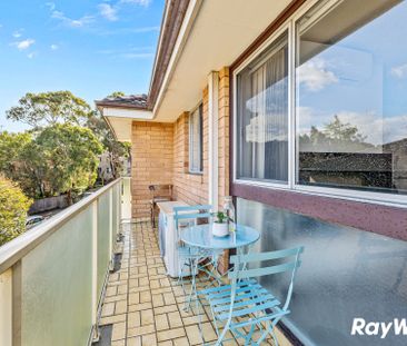 Renovated top-floor unit positioned at the rear of the complex, wal... - Photo 3