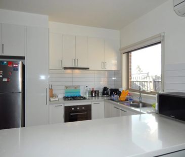 Stylish Three-Bedroom Home in a Convenient Reservoir Location - Photo 5