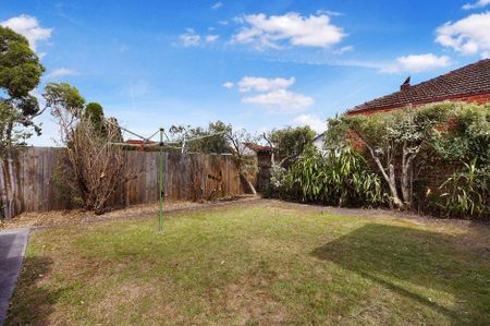 Spacious Home with Gardening Included - Photo 5