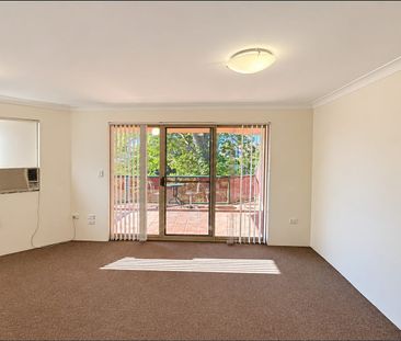 TWO BEDROOM UNIT WITH RIVERSIDE VIEWS ! - Photo 1
