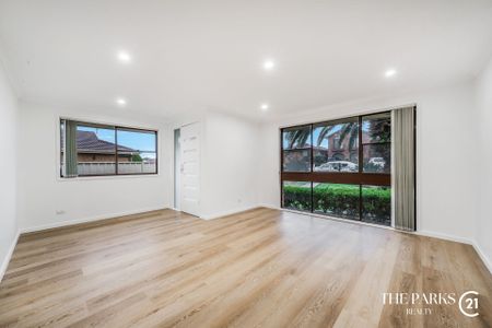 Newly Renovated Family Home in Sought after Bossley Park - Photo 3