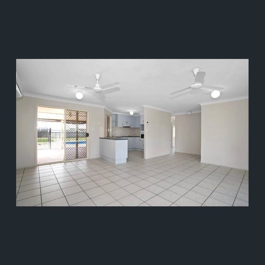 Situated in the premier suburb of Glenella, this well-presented, low set brick home is an absolute delight inside and out! Conveniently located in a f - Photo 1