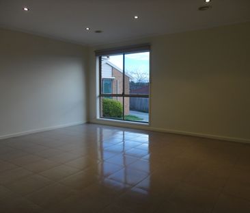 Positioned in a quiet and convenient pocket of Meadow Heights, this... - Photo 5