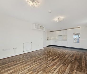 A second floor apartment with a west facing balcony and lots of lig... - Photo 3