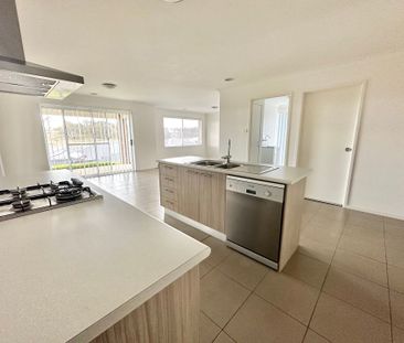 Modern Four Bedroom Home in a Desirable Location! - Photo 1