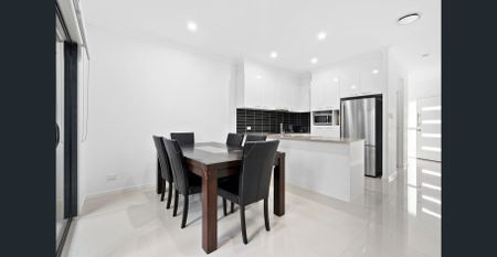 Modern Townhouse in Sought After Location - Photo 3