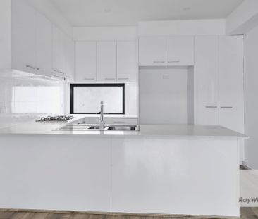 Stunning Three-Level Urban Retreat | Style Meets Convenience - Photo 4