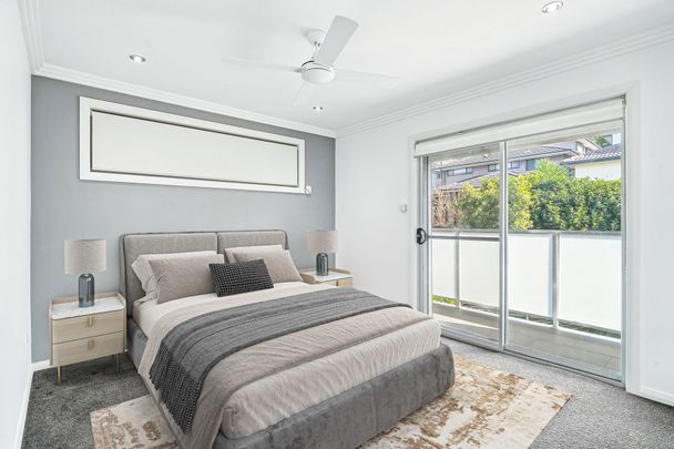 Modern Family Home with Basement Parking - Photo 1