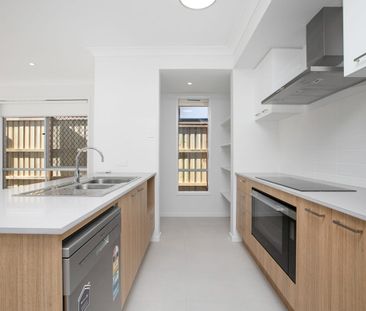 Spacious 4-Bedroom Home in the Heart of Redbank Plains! - Photo 6