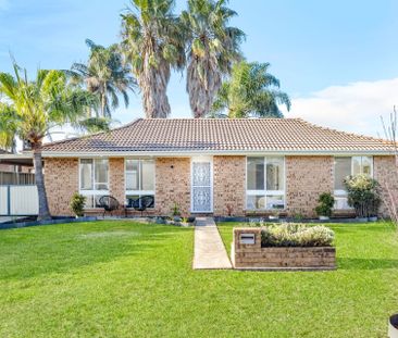 RENOVATED AND READY TO MOVE IN Three Bedroom Residence Close to All... - Photo 1