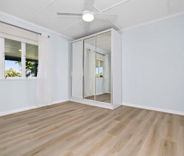 Charming 3-Bedroom plus Rumpus Home in Manly West with Endless Poss... - Photo 6