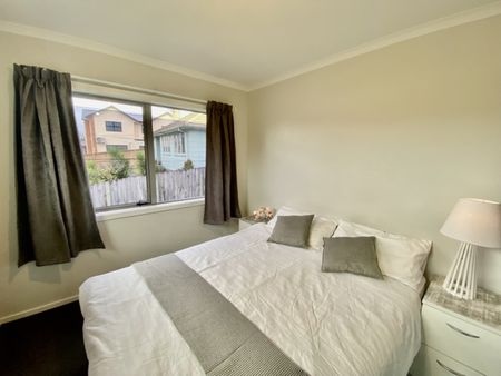 This beautiful and modern upstairs unit is just a 5-minute walk to Waikato & Braemar Hospitals and a stone's throw away from the CBD & Wintec. - Photo 3
