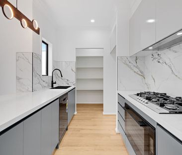 Contemporary Three-Bedroom Townhouse with Park Views & Double Garage - Photo 5