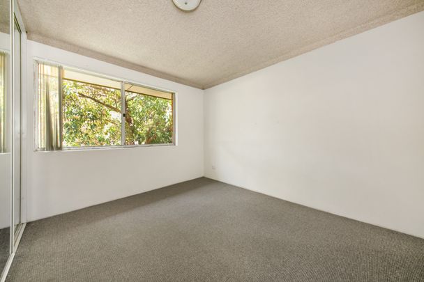 Air-Conditioned One Bedroom Unit with Built-in Wardrobe and Single Car Space! - Photo 1