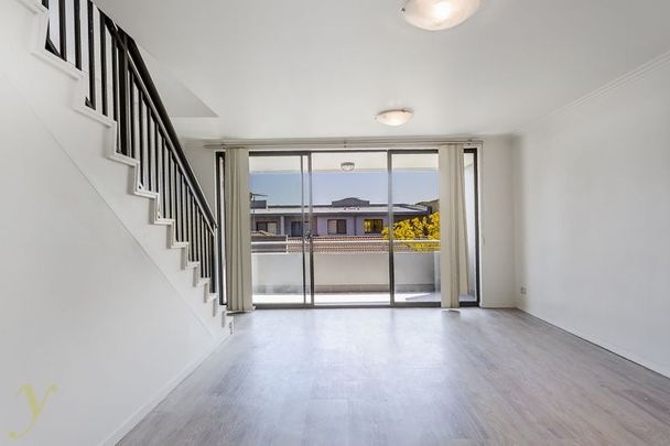 Sophisticated Urban Living - Split Level One Bedroom Apartment - Photo 1