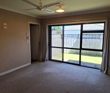 Discover comfort and convenience in this four-bedroom, two-bathroom... - Photo 3