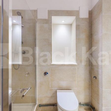 Spacious Studio located within a warehouse conversion with exposed brick - Photo 3