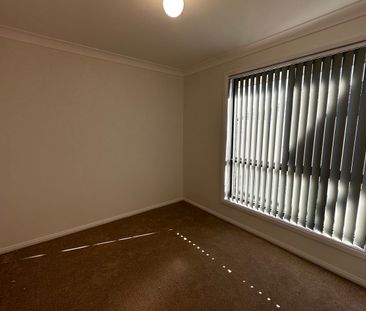 Low Maintenance Three Bedroom Unit in Convenient Location - Photo 4