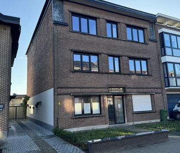 Gerenoveerd gelijkvloers appartement met tuin te huur - Photo 6