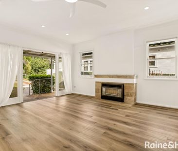 FAMILY HOME WITH LARGE SUN FILLED YARD - Photo 1