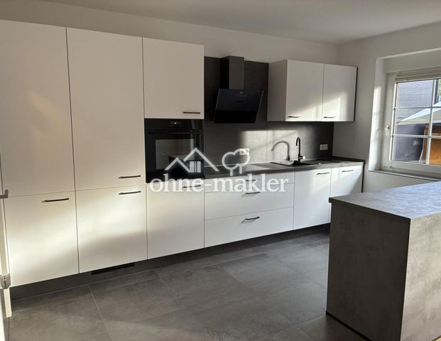 Provisionsfrei: Stillvolle 2-Zimmer-Erdgeschosswohnung mit Südterrasse und eigenem Garten - Photo 1