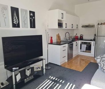 Top-Floor 1-Bedroom Apartment with Balcony - Photo 4