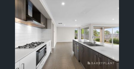 Stylish Four-Bedroom Retreat with Alfresco and Multiple Living Zones - Photo 5